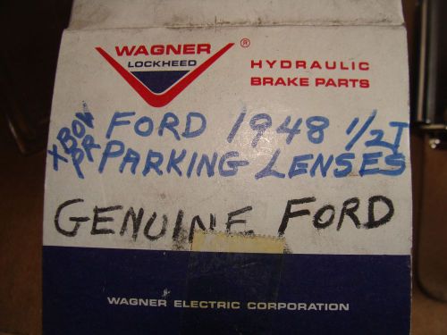A pair of 1948 ford pickup parking light lenses glass