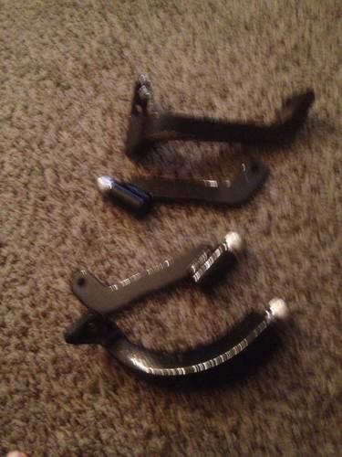 Harley road king floorboard brackets.