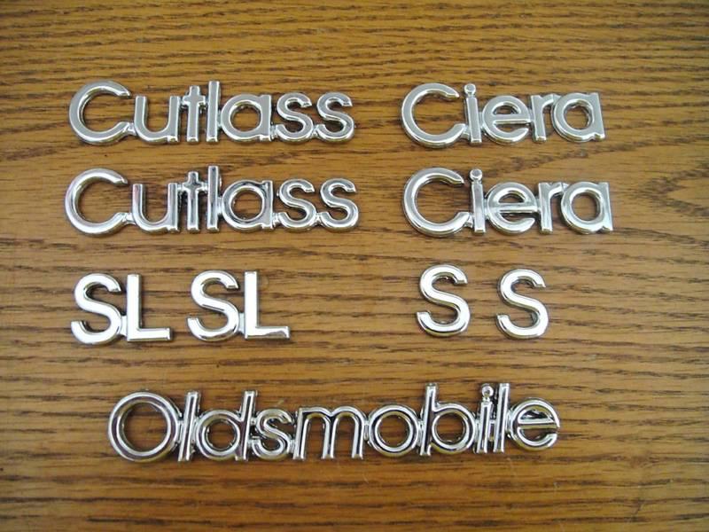 82-96 oem gm olds cutlass ciera hood and fender nameplates s or sl emblem