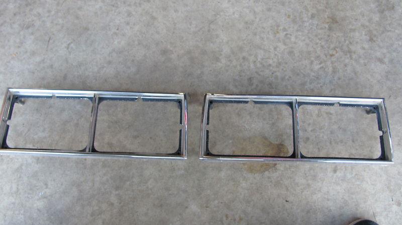 1981-1987 pontiac grand prix headlight lamp bezels pair trim oem chrome 81-87