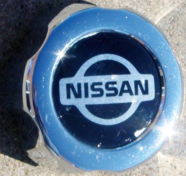 '96 97 nissan pickup / '97 98 99 nissan pathfinder chrome 62344 center cap used