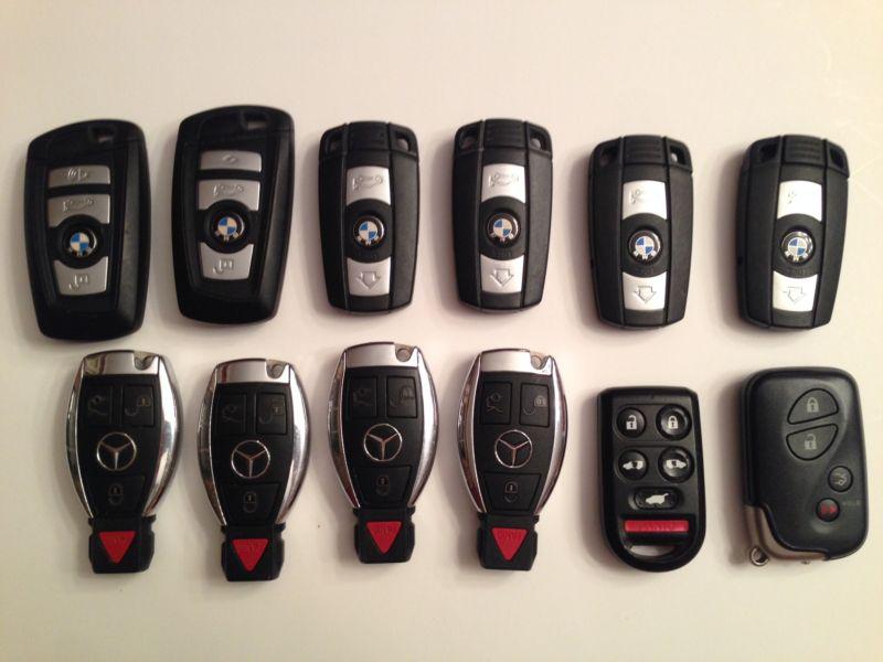 Lot of 12 misc keyless remotes key fobs - no reserve sale!!