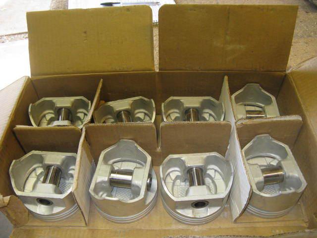 Nos standard pistons for chevrolet 350 v8 -- cast aluminum with pins
