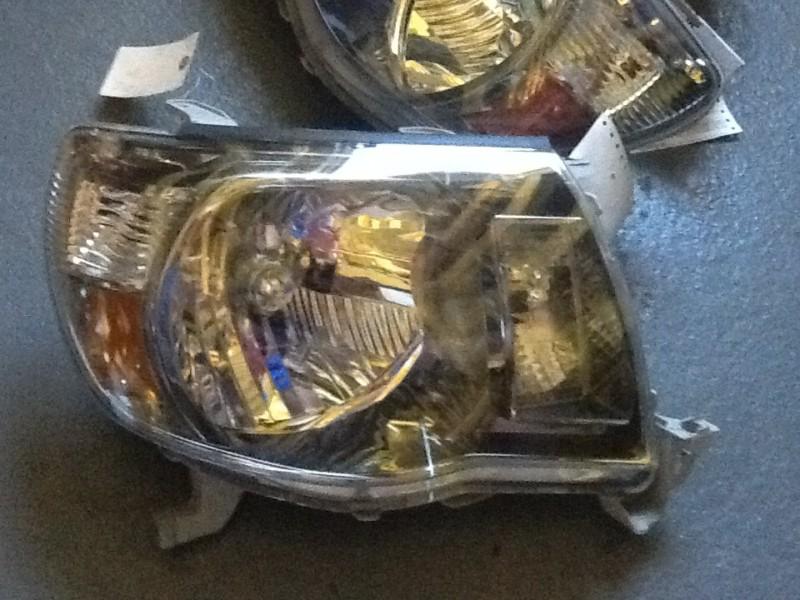 Toyota tacoma  smoked bezel headlight oem  05 06 07 08 09 10 11