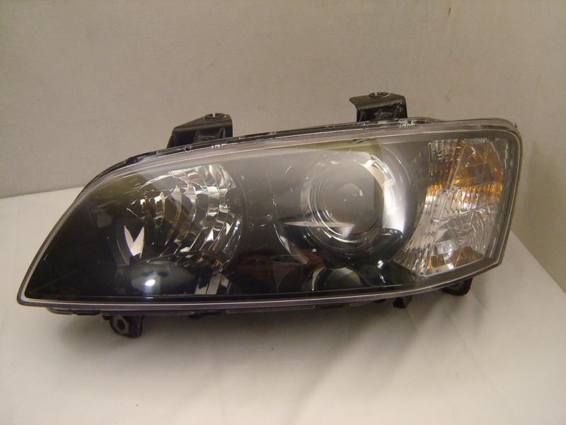 Pontiac g8 left halogen headlight 08 09 oem