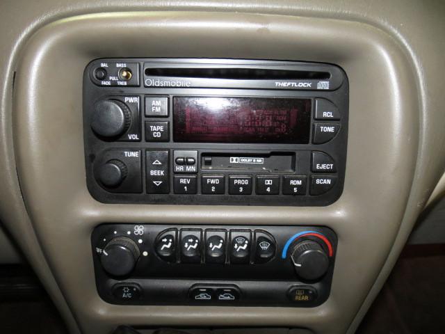 1999 oldsmobile intrigue radio trim dash bezel 2543728