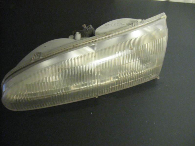 Ford contour head light left side 97 96 95 original part