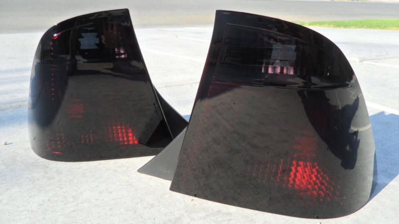 2005-2007 focus zx4 4d  smoked tail lights black oem tinted non led 05 06 07