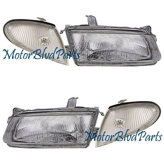 95-96 protege headlights+signal lights left+right 4pc