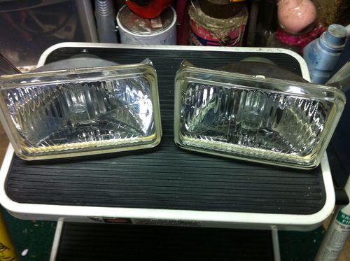 Pair of hella 02 24461 rectangular h4 halogen hi/lo beam headlamps h4656 167mm