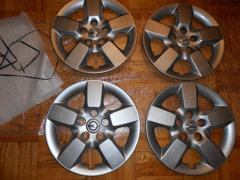 4 nissan hub cap 16" 