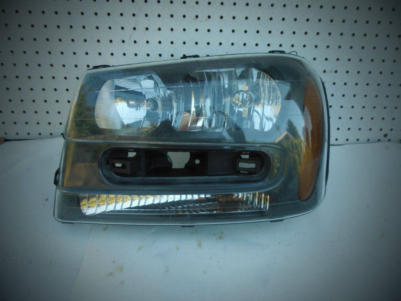 13008 2002-2006 chevy trailblazer left driver side headlight oem 