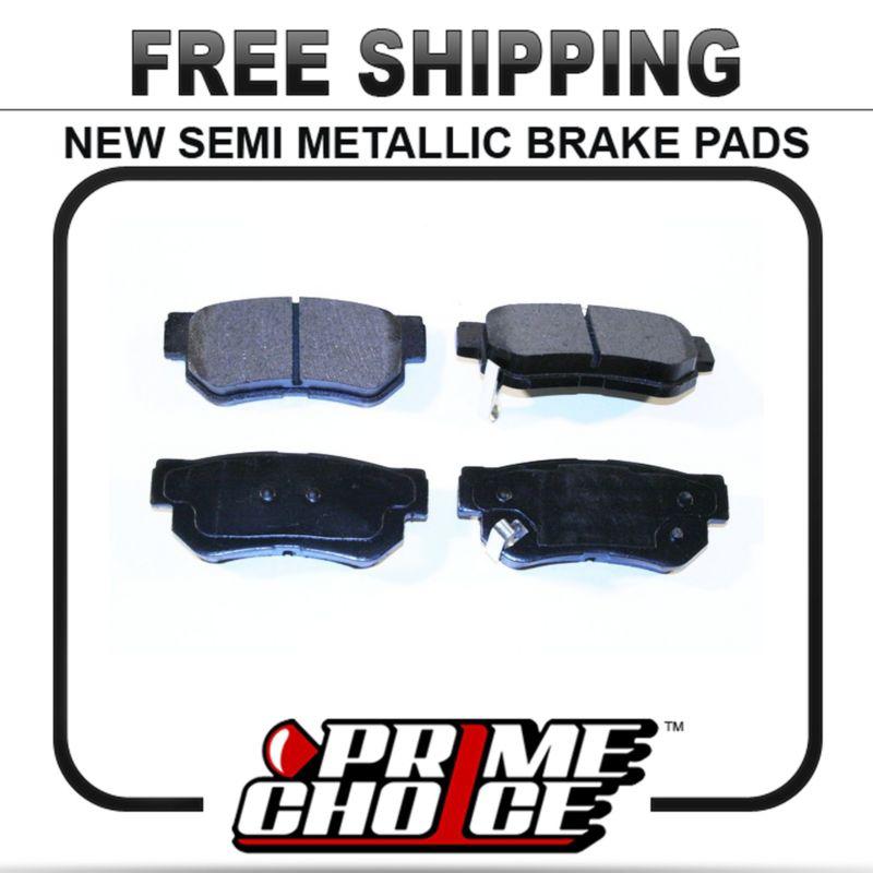 New premium complete set of rear metallic disc brake pads with shims