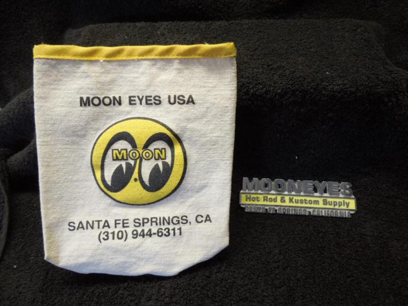 Two pieces of vintage mooneyes memorabilia including cloth litterbag and emblem