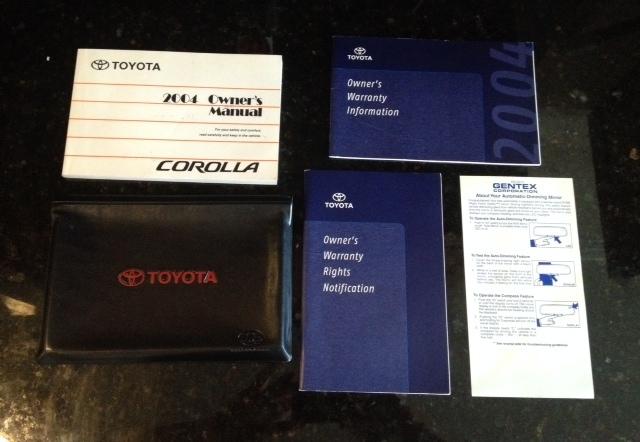 04-2004 toyota corolla owner's manual with books and case.