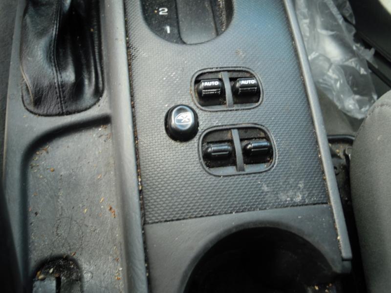 05 jeep liberty interior switches,this is the console mtd window switch