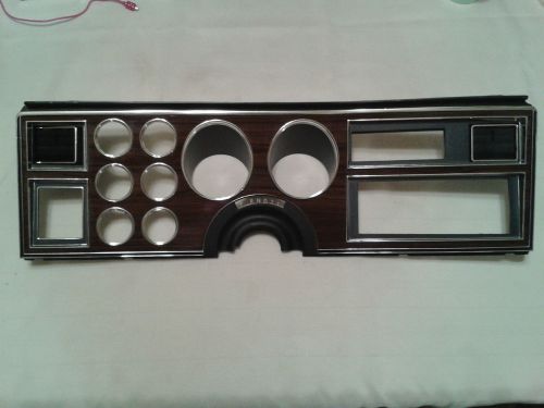 1979-1985 lebaron,new yorker,imperial instrument cluster wood grain/chrome bezel