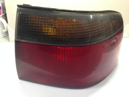 Cadillac seville sts &amp; sls  (98-04) rh passenger side tail light oem - used