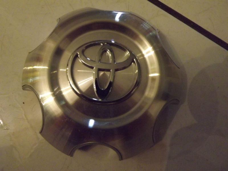 Gently used oem toyota  tundra sequoia steel wheel center cap  machine finish