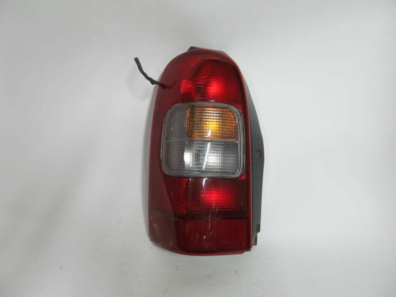 97 98 99 00 01 02 03 04 05 venture montanta transport oem left tail light nice!