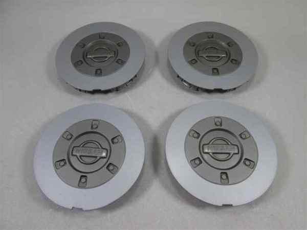 2001 nissan maxima set of 4 center caps w/logo 17" oem