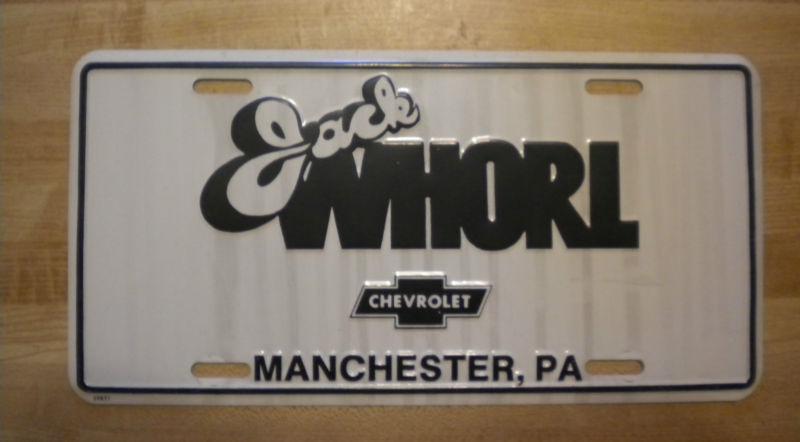 Jack whorl chevrolet dealer booster license plate metal chevy manchester pa