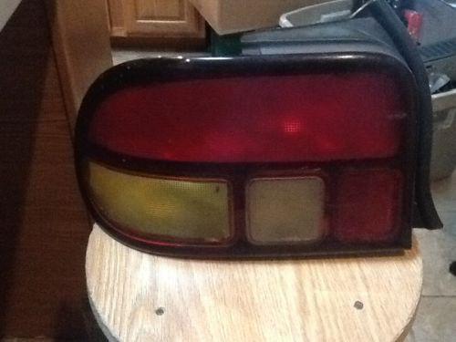 Oem aspire tail light lamp taillight left drivers side 97 good condition