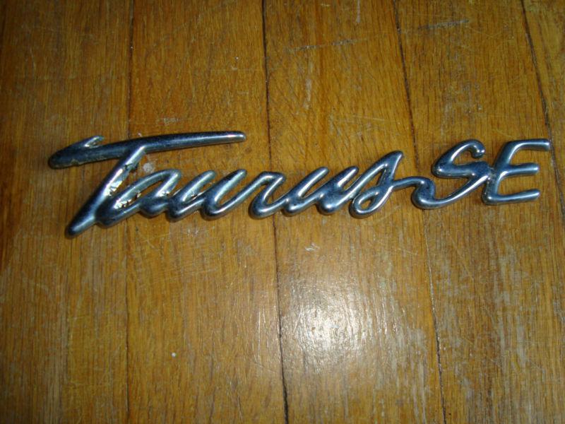 Ford taurus se plastic chrome rear script emblem  