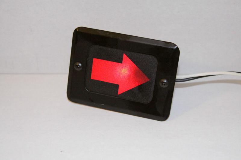 Red directional arrow