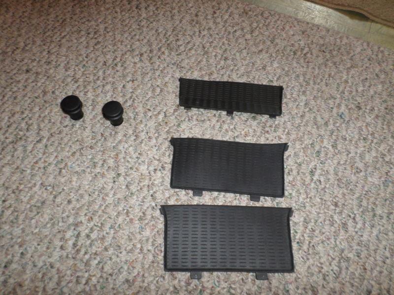 2011 black rubber liners for the back of console has  2 shelfs  these are liners