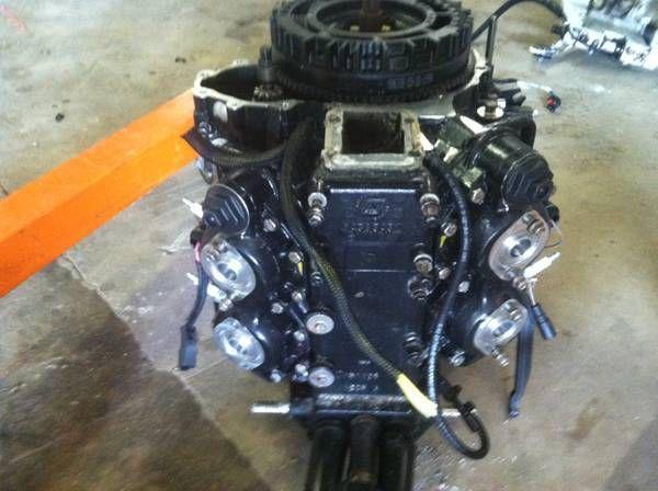 Power head assembly for a 1998 johnson 115 ficht outboard motor