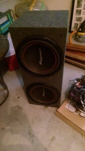 Two pioneer 12&#039; speakers in box