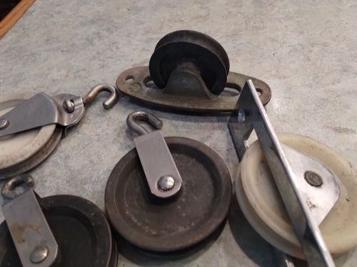 Various tiller steering cable pulleys and brackets pre-owned