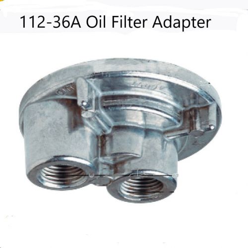 Remote oil filter adapter allows filter relocation for racor lfs system