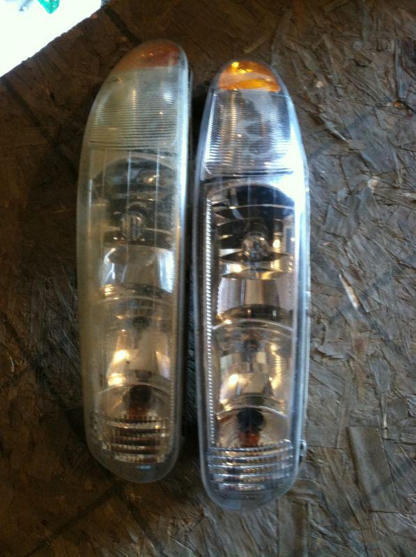 Pair of buick century headlights 97 to 05