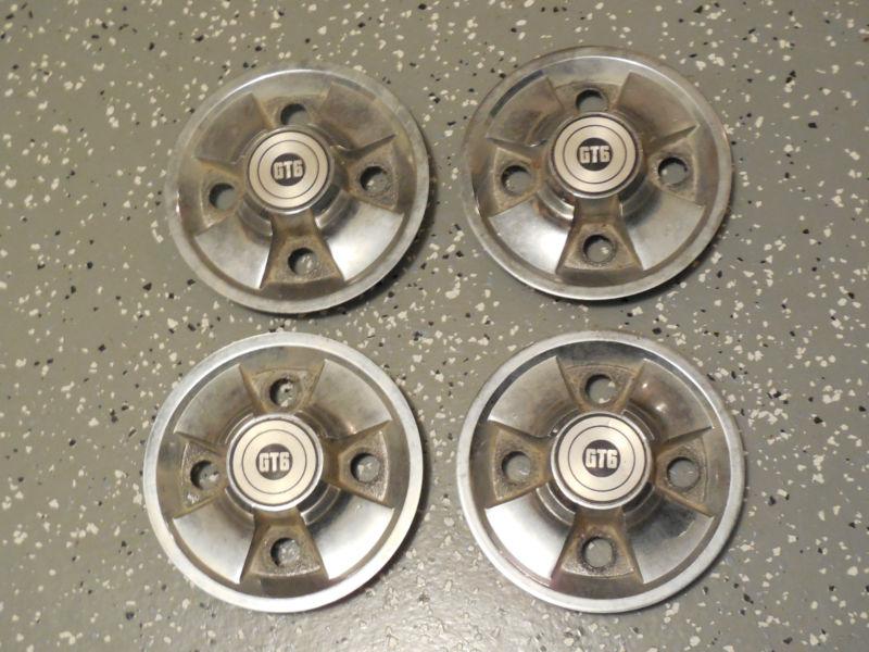 4 original triumph gt6 wheel center caps ~ full set ~for a 67 68 69 70 71 72 73