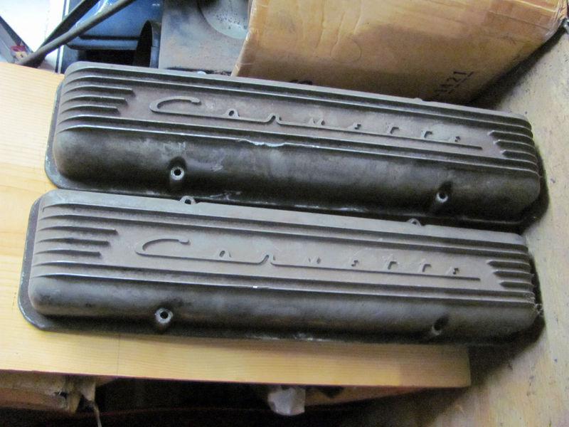 1957 chevrolet corvette valve covers offset holes? used. some damaged to fins, s