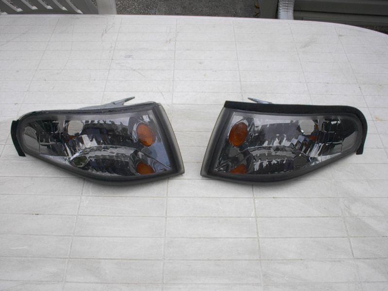 94-98 mustang left & right aftermarket parking lamps used good condtion