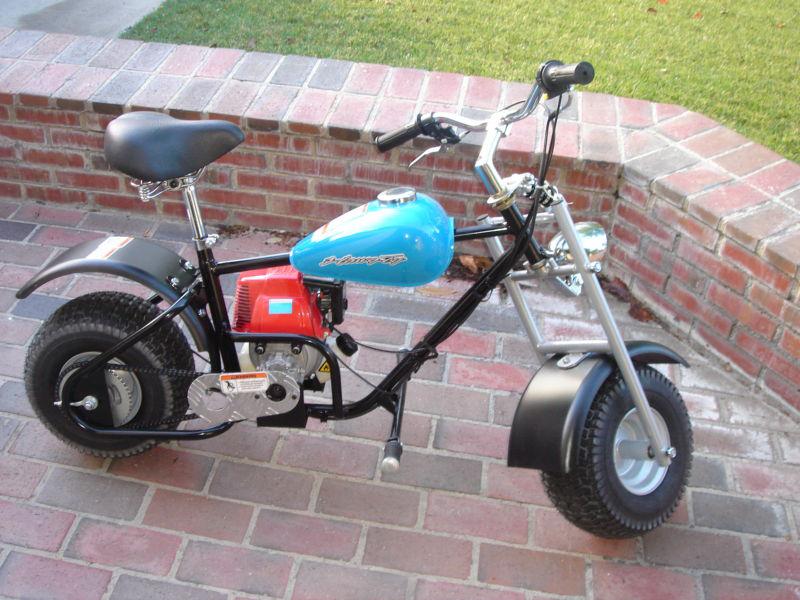 New in box, 1.0hp 4-stroke gas engine chopper scooter,local pick-up only