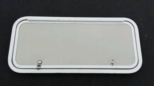 Rv cargo door  - tan w/ white trim - nos winnebago  31 1/8&#034; x 14 1/8&#034; outside