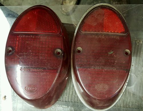 Vintage pair of original 1962-67 volkswagen beetle hella tail light lens &amp; bezel