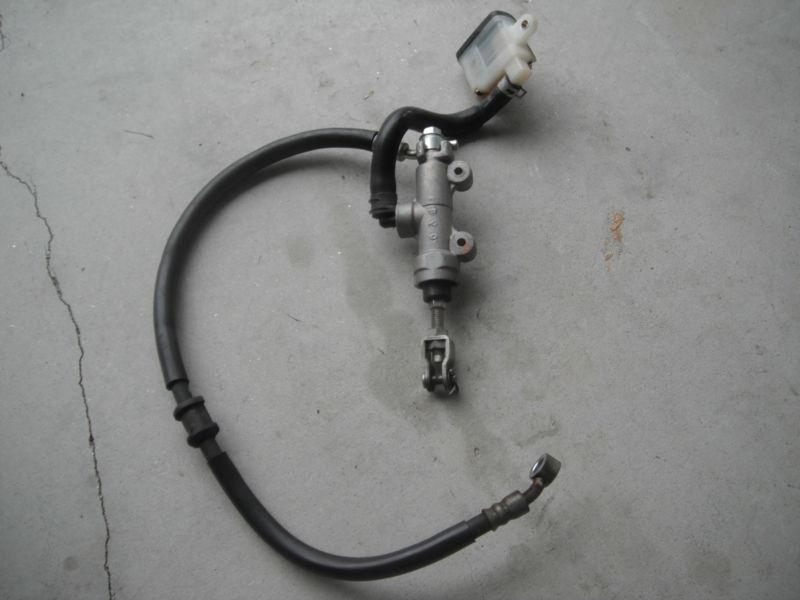06 07 gsxr 750 ii rear brake master cylinder and resevoir with lines
