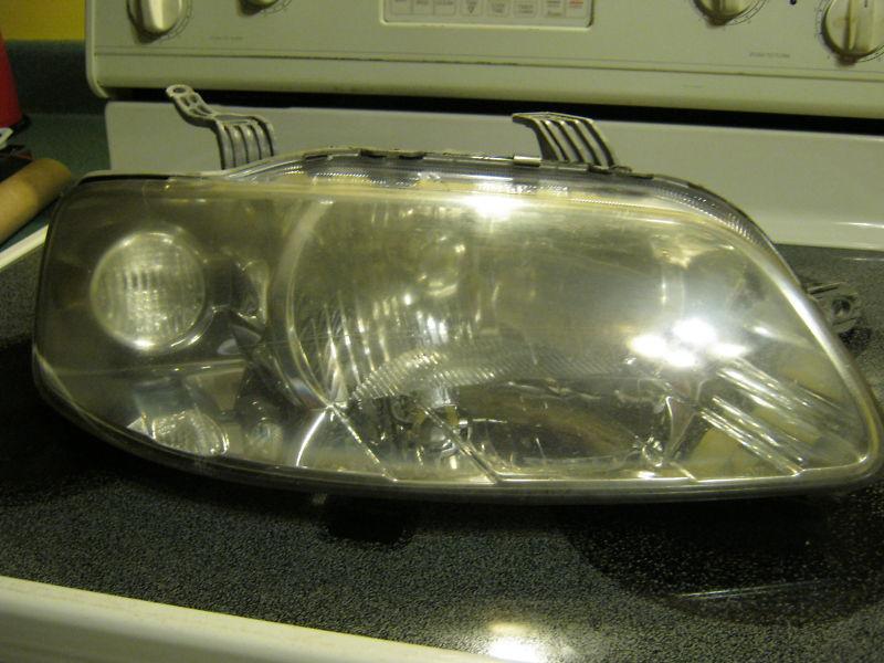 Chevy aveo sedan 04-06 headlight left rh