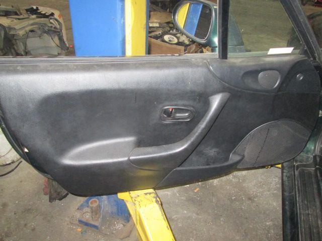 Left fr door trim panel mazda miata 1999