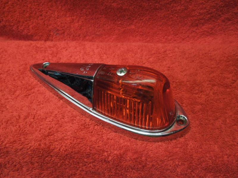 New-old-stock chrome napa 718 marker light with red dietz lens