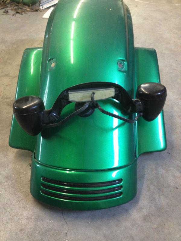 Road glide rear fender with tail light and filler panel