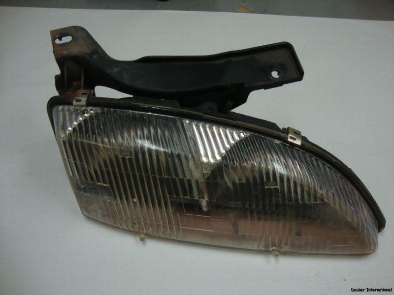 97 98 99 00 chevrolet cavalier passenger side headlight assembly rh oem