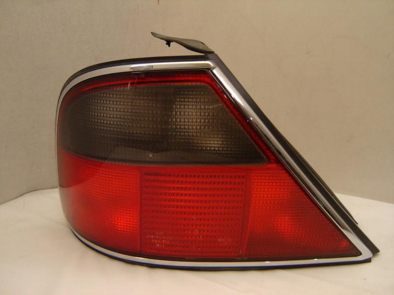 Jaguar xj / xj6 / xj12 left tail light 95 96 97 oem