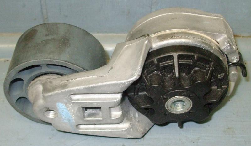 Belt tensioner, p/n 3973824 supercedes p/n 3936206