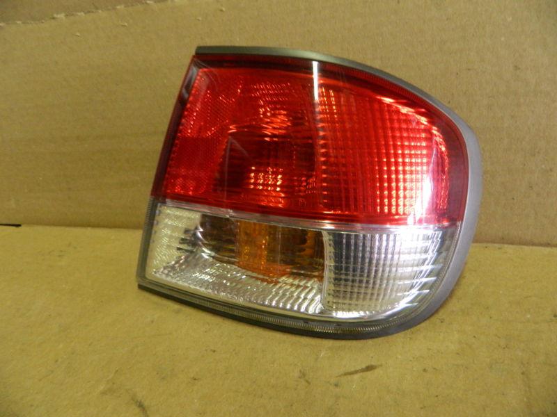 Infiniti g20 rh outer tail light 99 00 01 02 passenger side